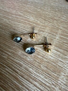 Gold Tone Stud Earrings with Faceted Gray Gem